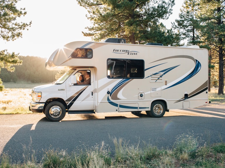 RV motorhome with slide-out extended — slide-out topper installation and service at EliteRV, Palmetto, FL